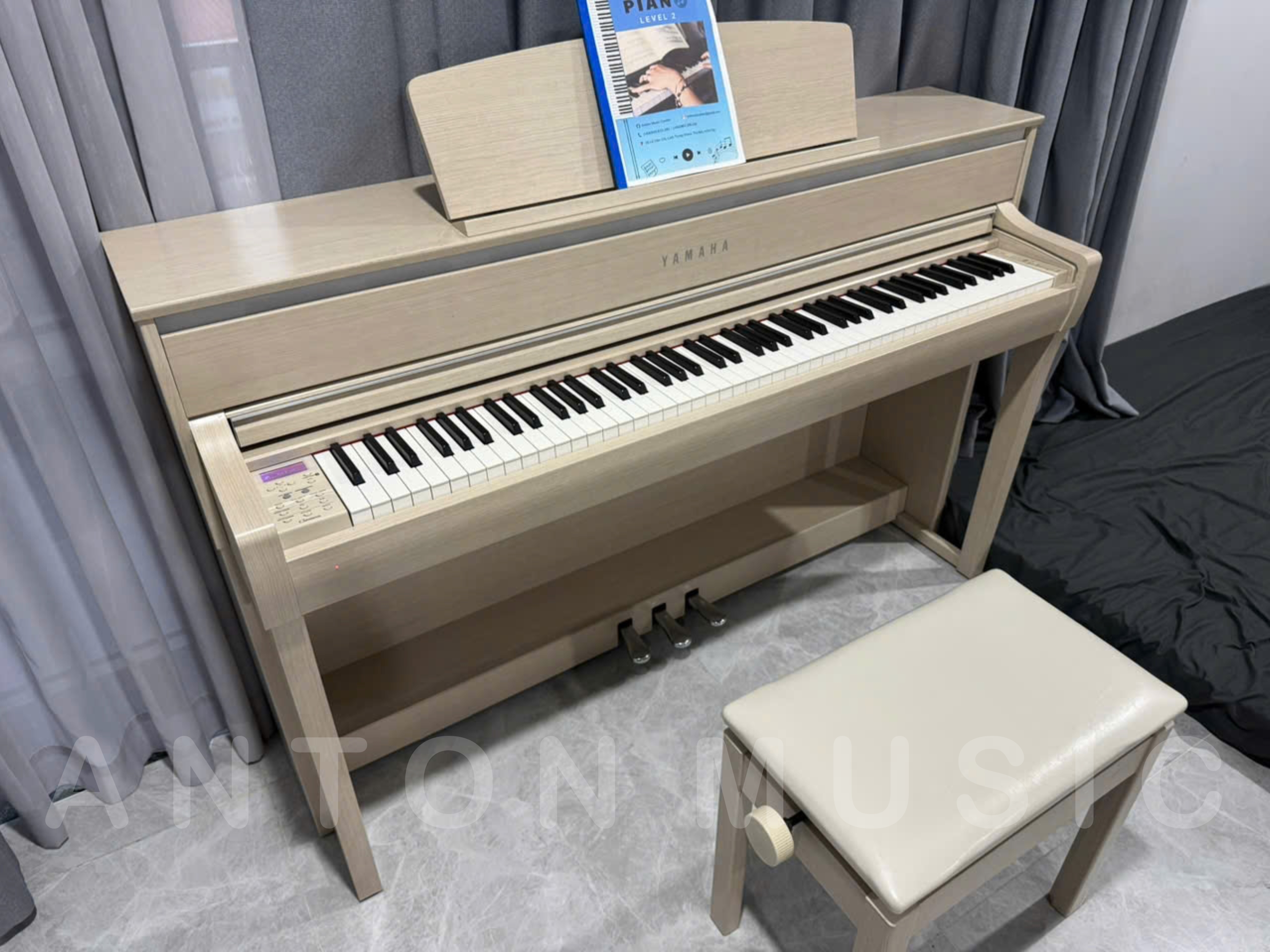 Đàn Piano Điện Yamaha CLP-675WA Màu Trắng Kem Ngà (600 Series) Clavinova